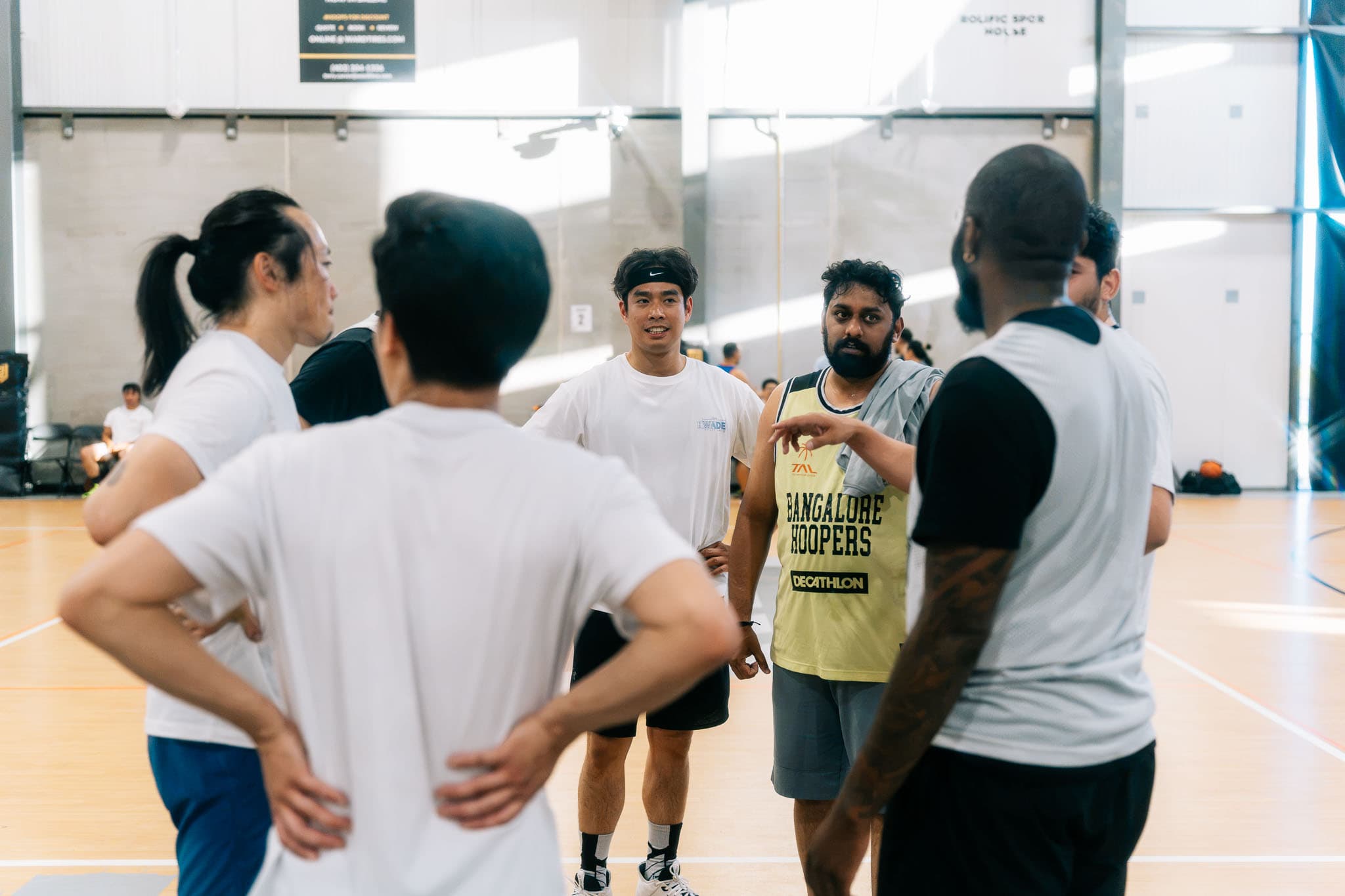 The huddle between games at an Unc League run